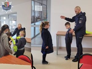 policjant pokazuje dzieciom jak prawidłowo przechodzić przez jezdnię