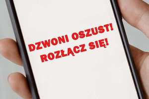 napis na telefonie dzwoni oszust rozłącz się