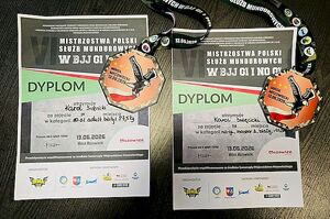 dwa dyplomy i dwa medale