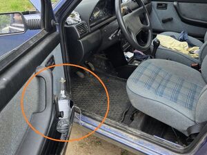 radiowóz i pojazd zatrzymanego kierowcy